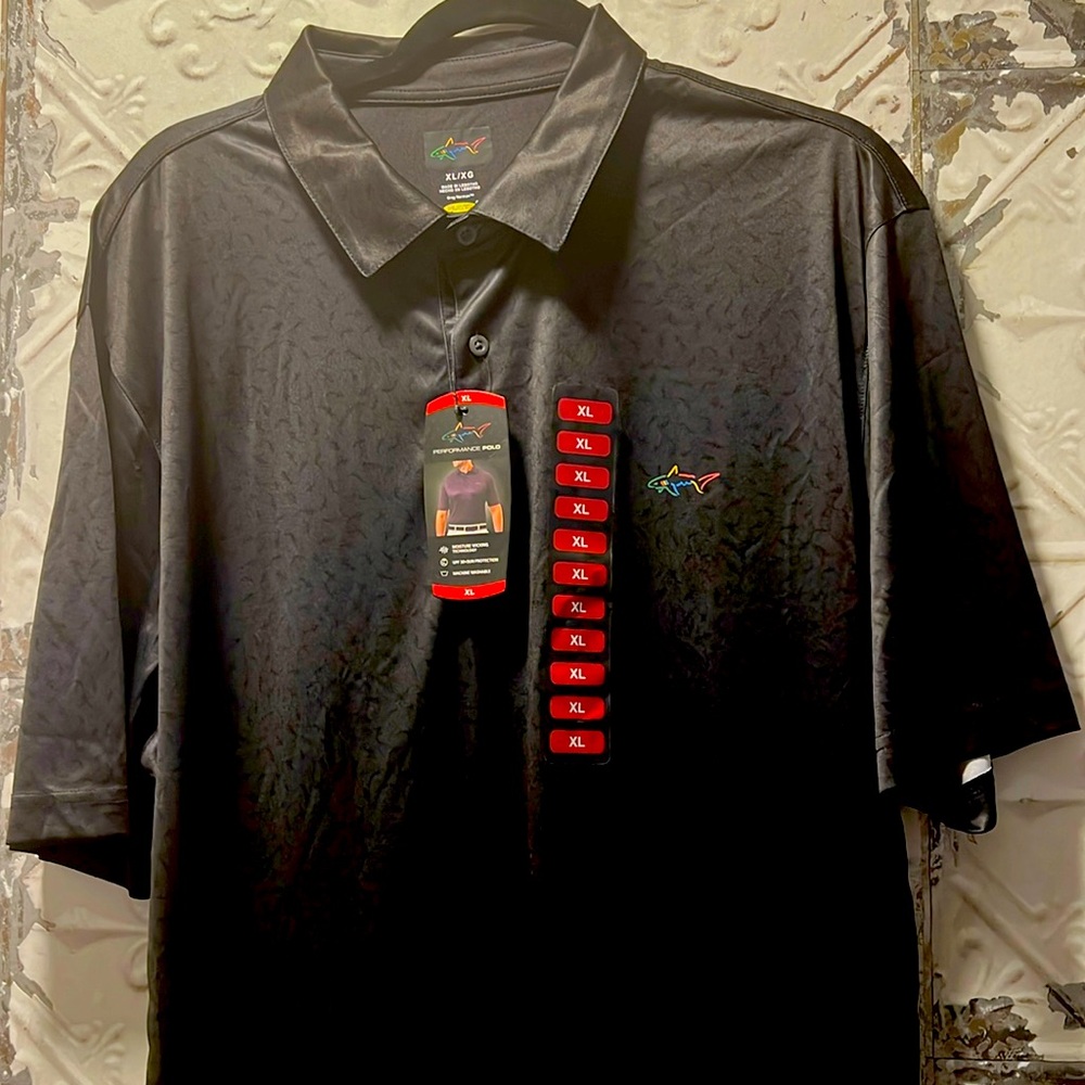Greg Norman black polo , brand new, never worn